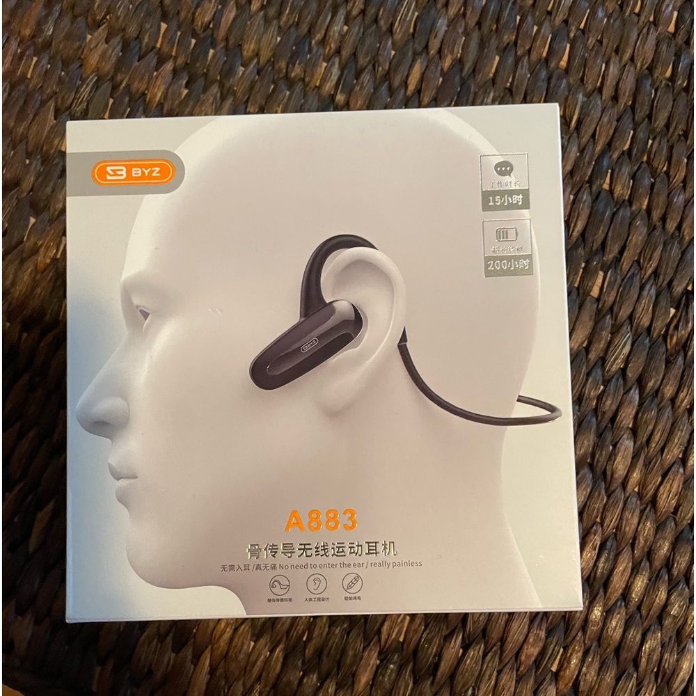 Brand new, in box, wireless, Bluetooth over the ear earphones.